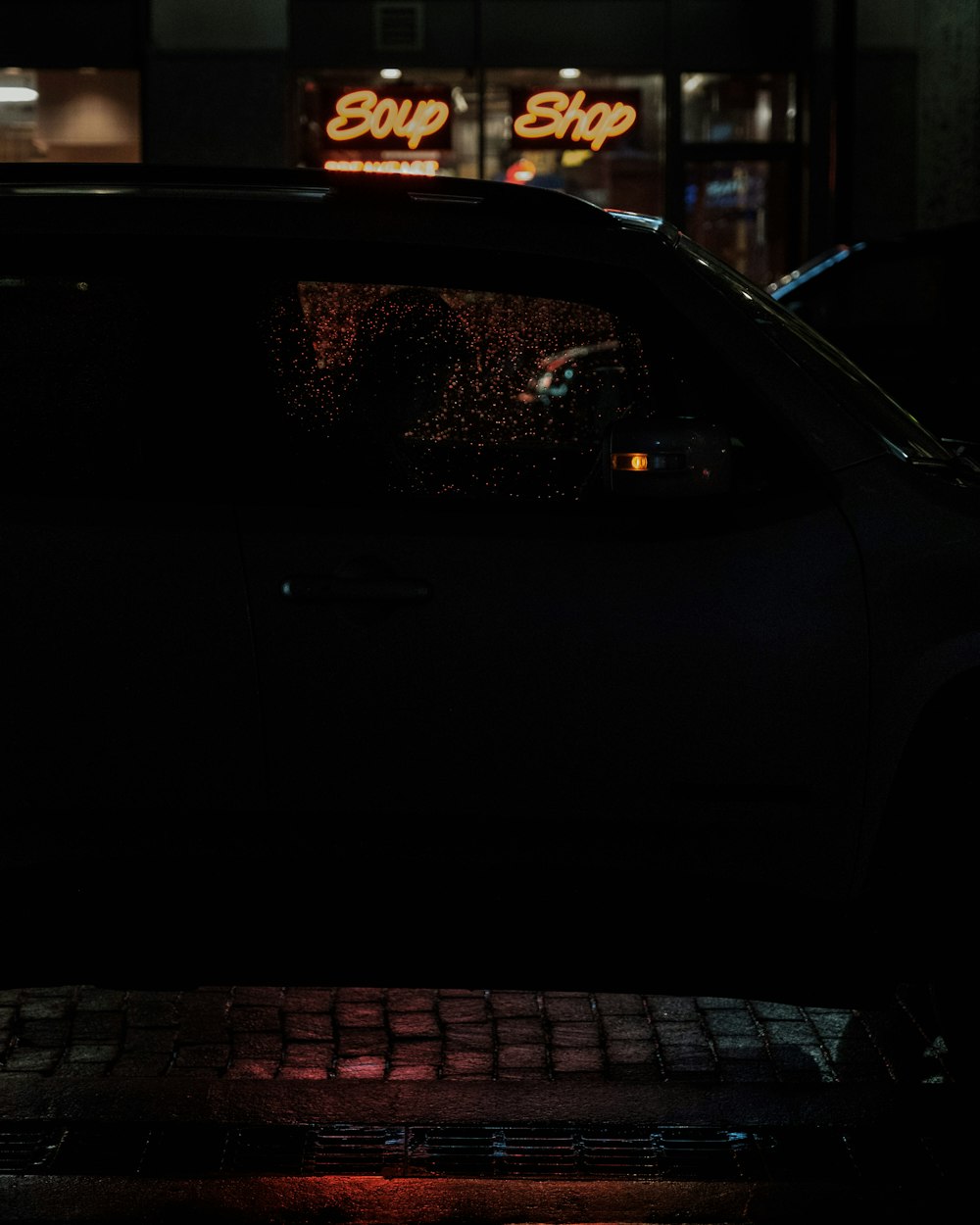 black car on road