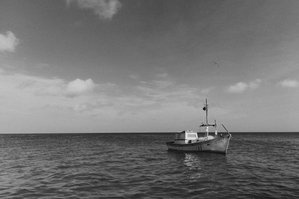 grayscale photography of boat