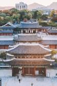 person walking towards temple