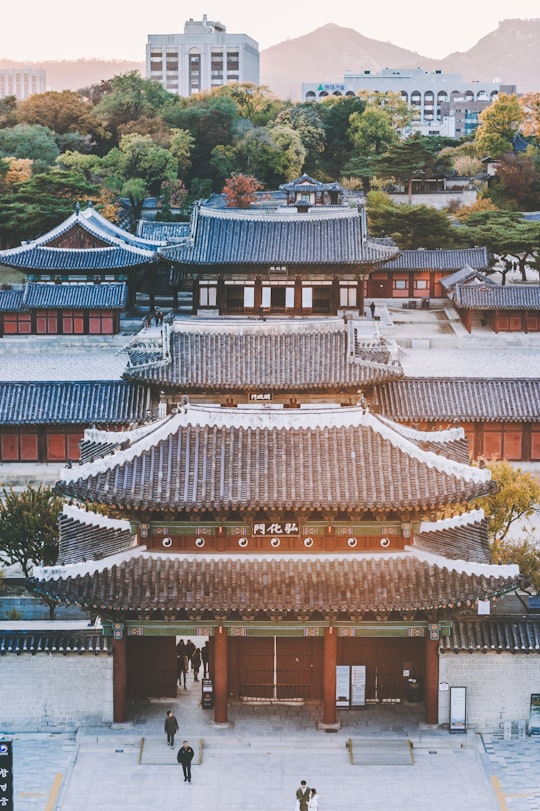 person walking towards temple in 101 Daehak-ro South Korea