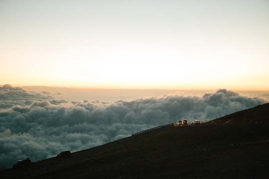 green mountain near white clouds during daytime in Pikes Peak United States