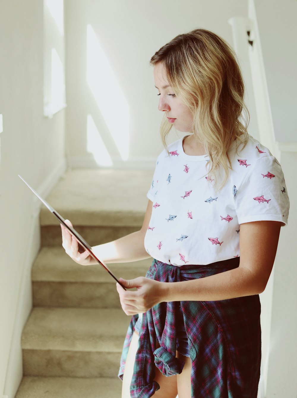 woman holding photo