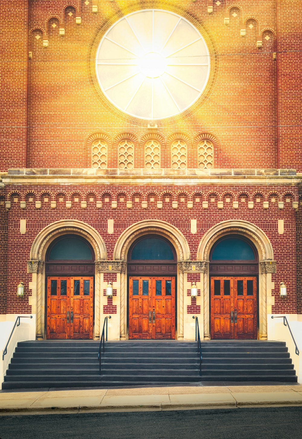 empty staircase and closed brown wooden doors at daytime