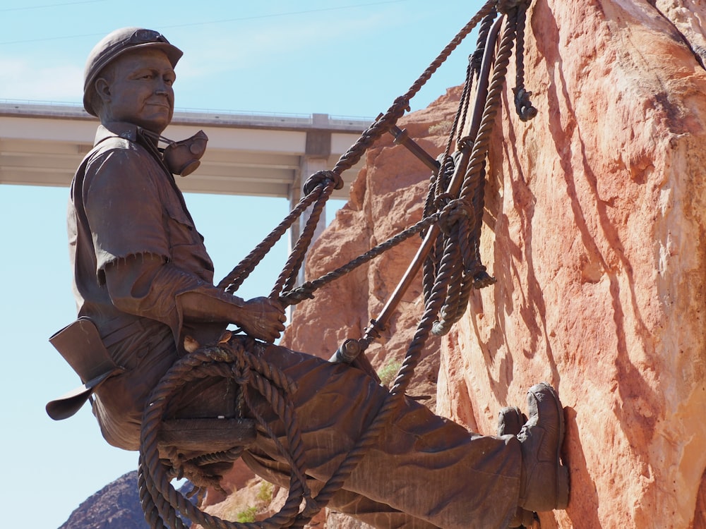 statue of man during daytime