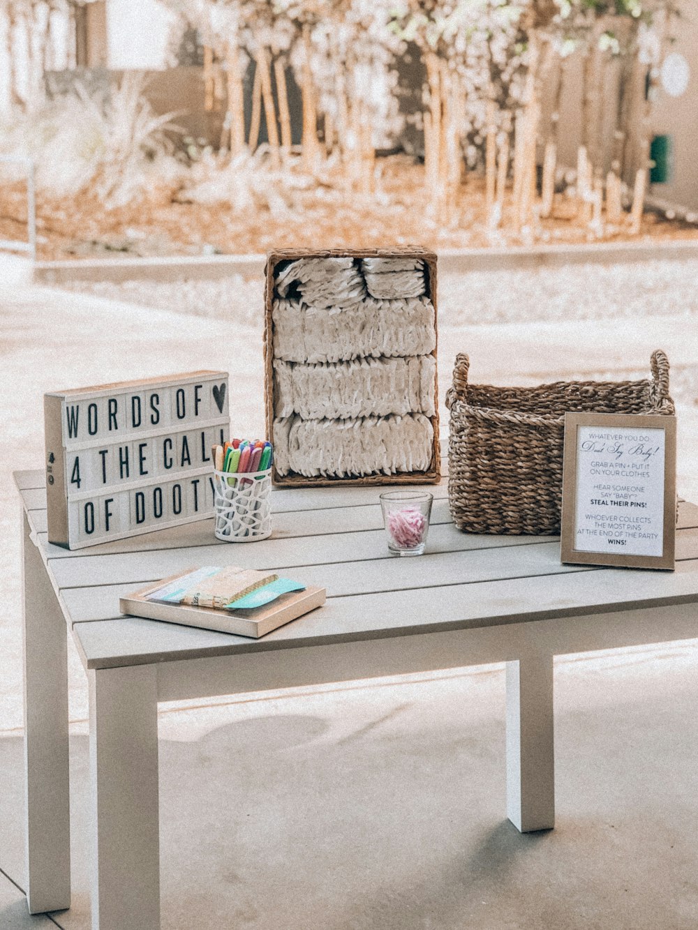 brown wicker basket on white wooden table