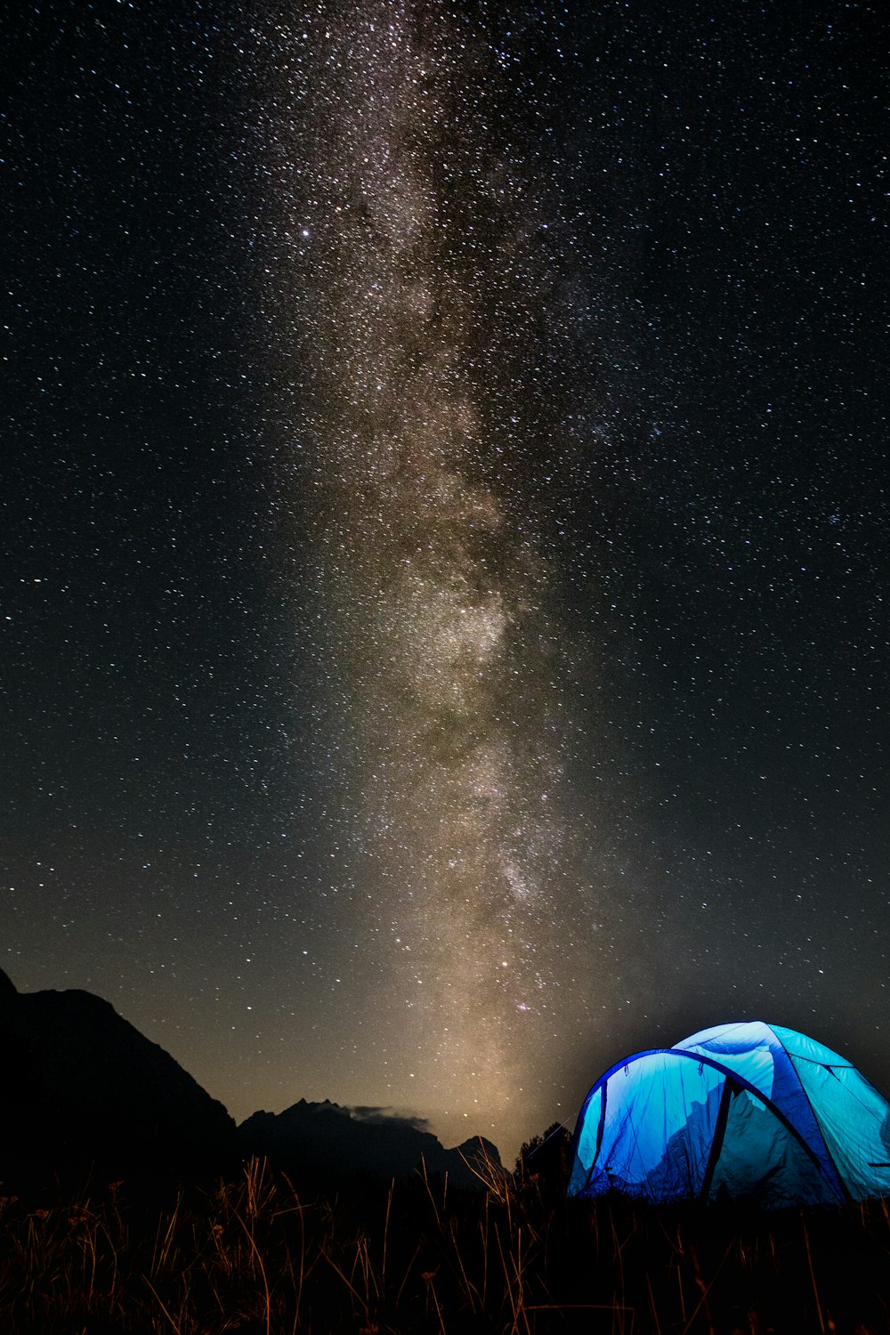 blue dome tent during nighttime