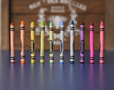 selective focus photography of Crayola crayons