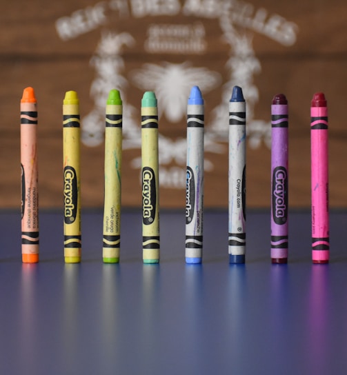 selective focus photography of Crayola crayons