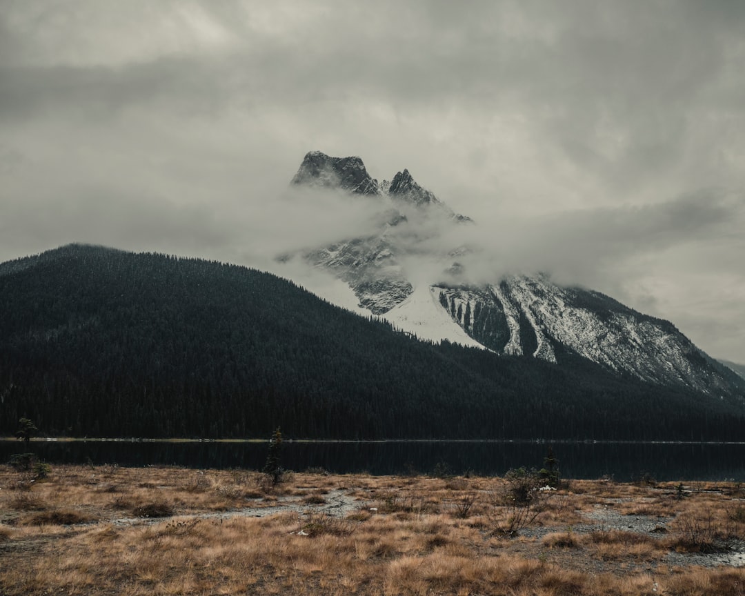 snow capped mountain under cloudy sky at daytime