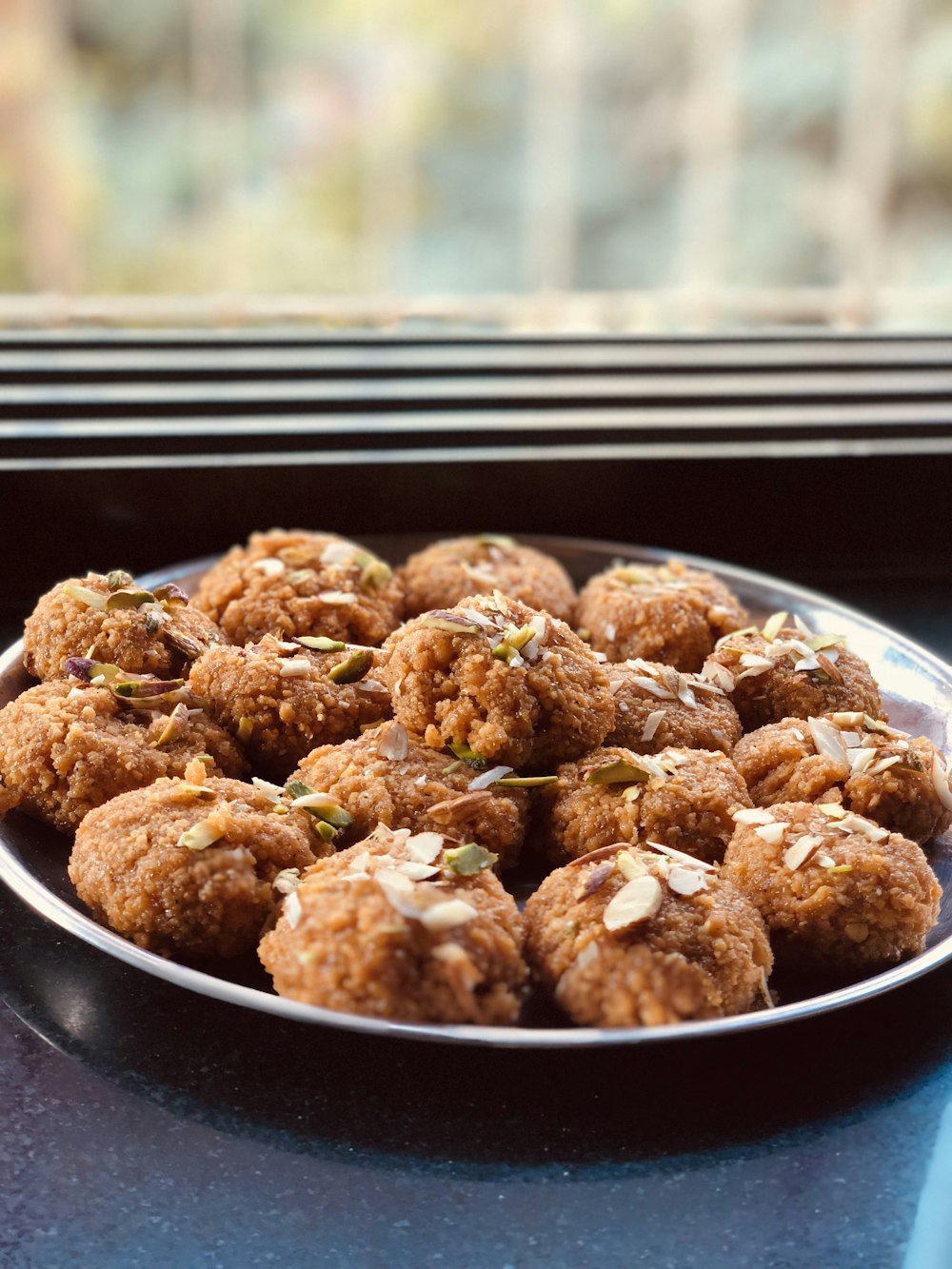 fried rice ball on plate near window