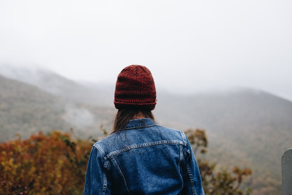 person standing on top of mountain