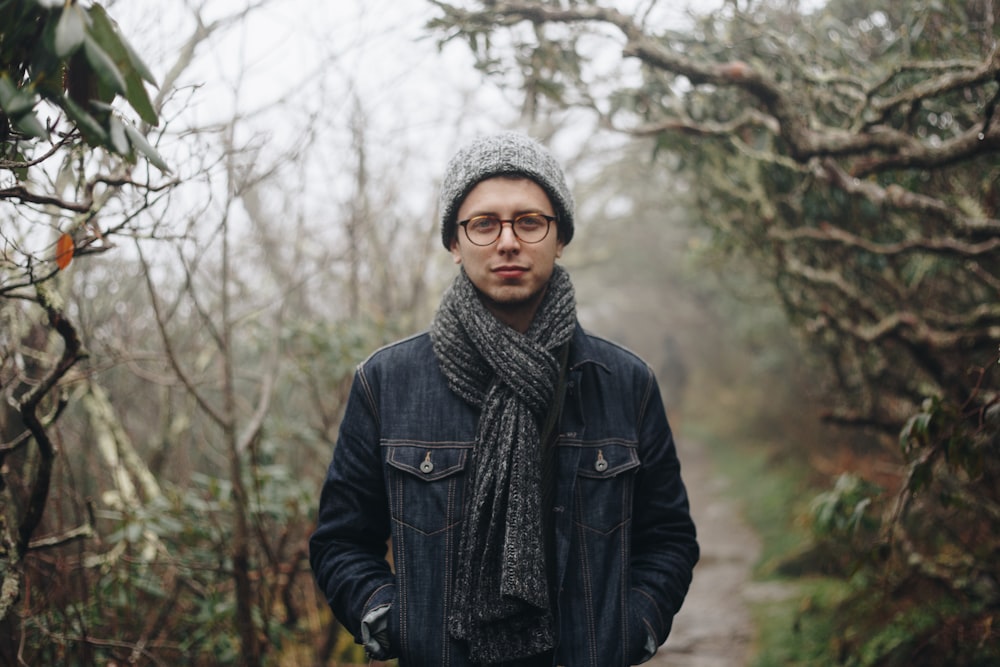 one unknown celebrity in black scarf