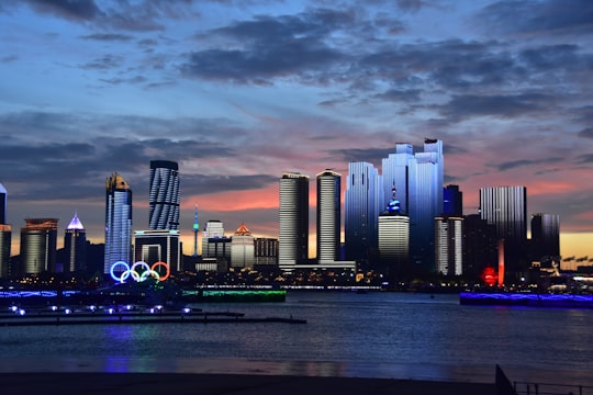 landscape photo of city building during dusk in Qingdao China