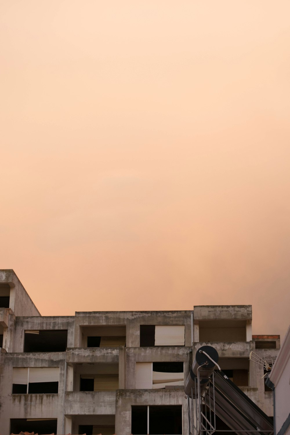 low-angle photography of white concrete building