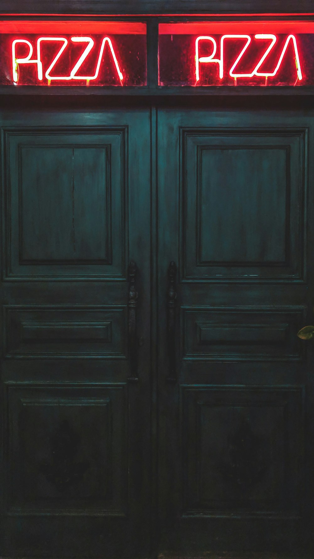 closed black wooden doors