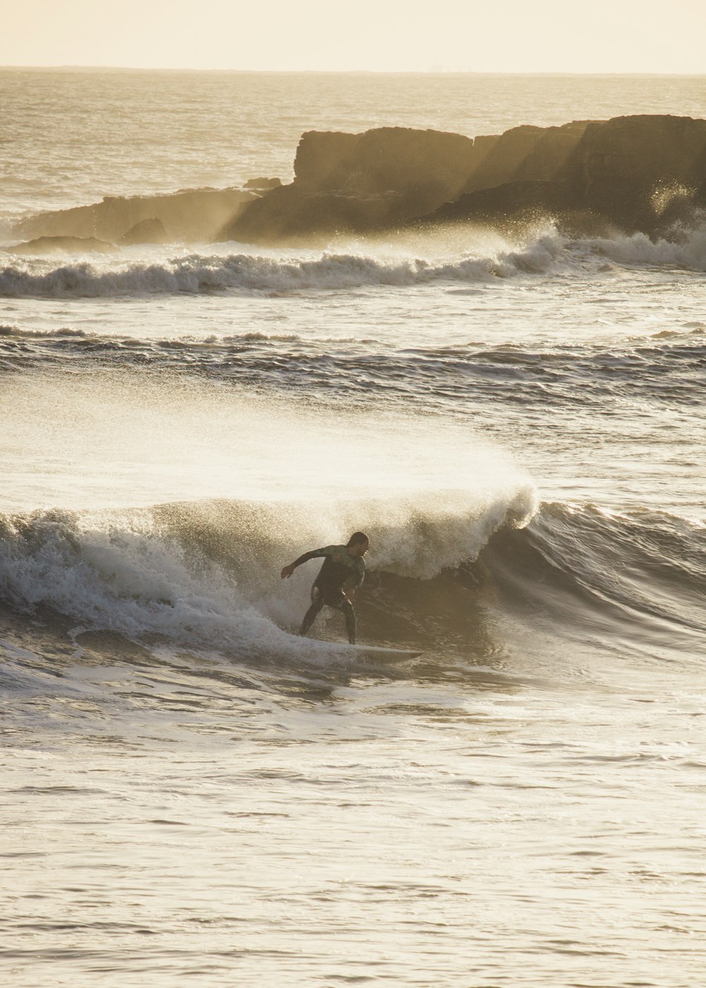 man surfing on waves