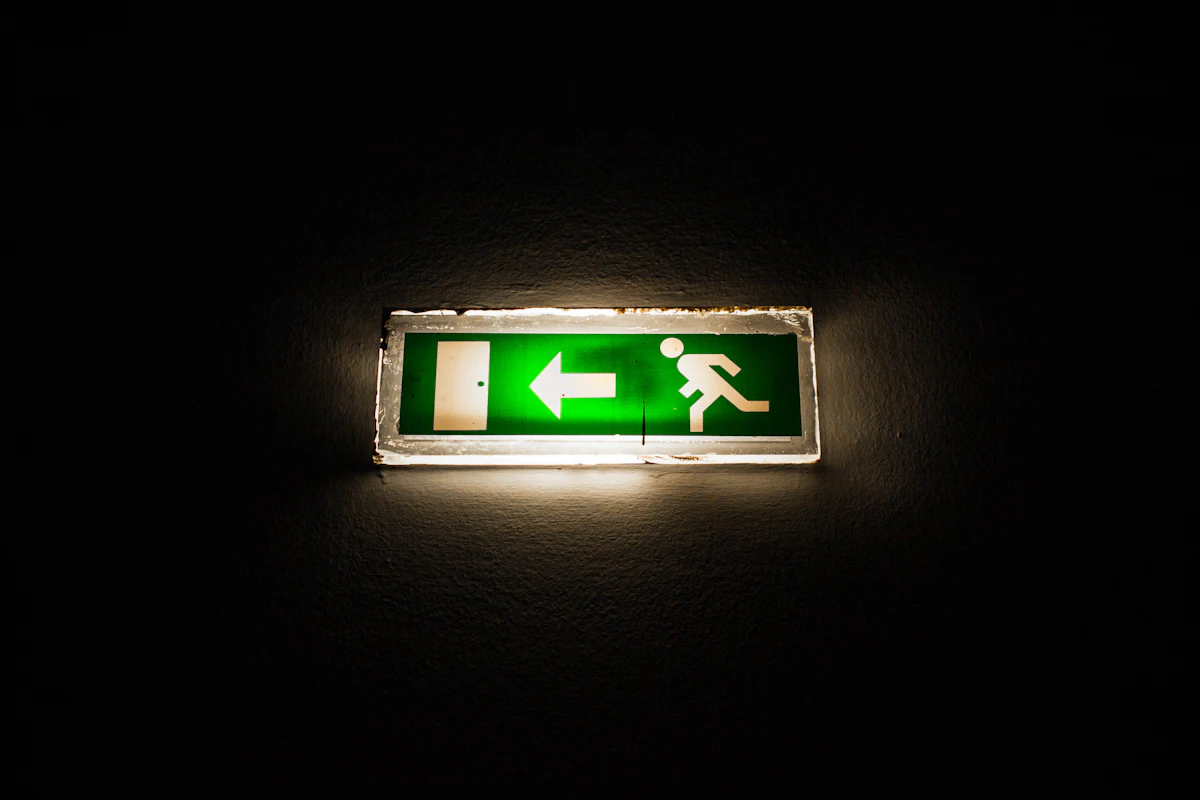 Illuminated emergency exit sign