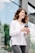 woman holding tumbler