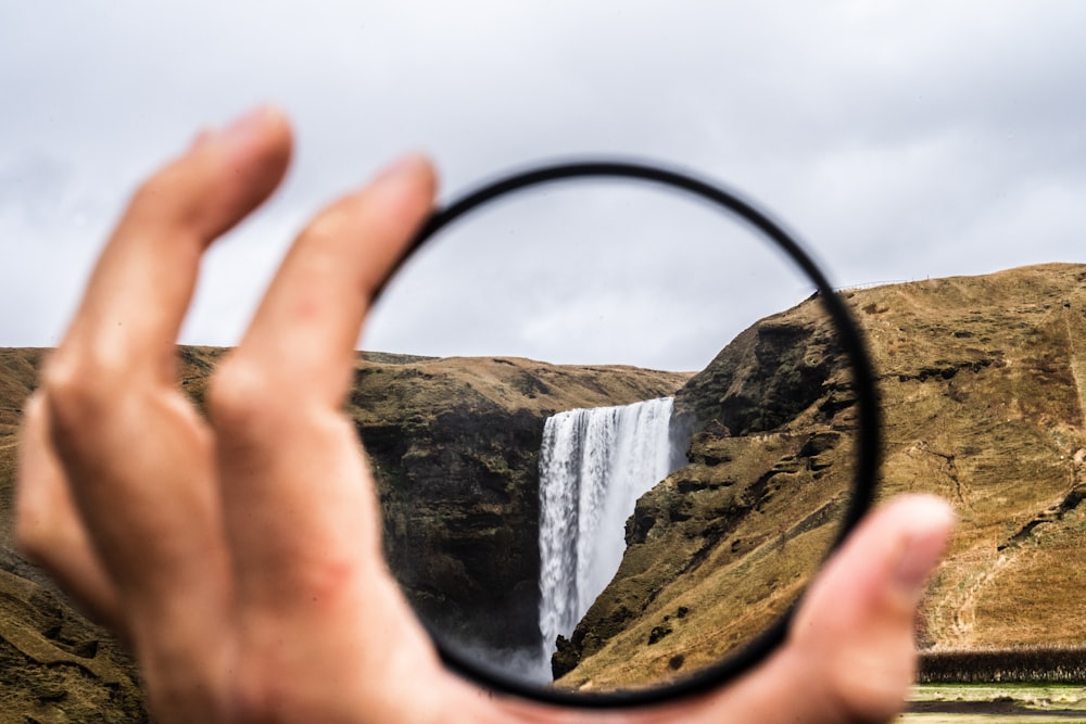 selective focus photography of waterfalls