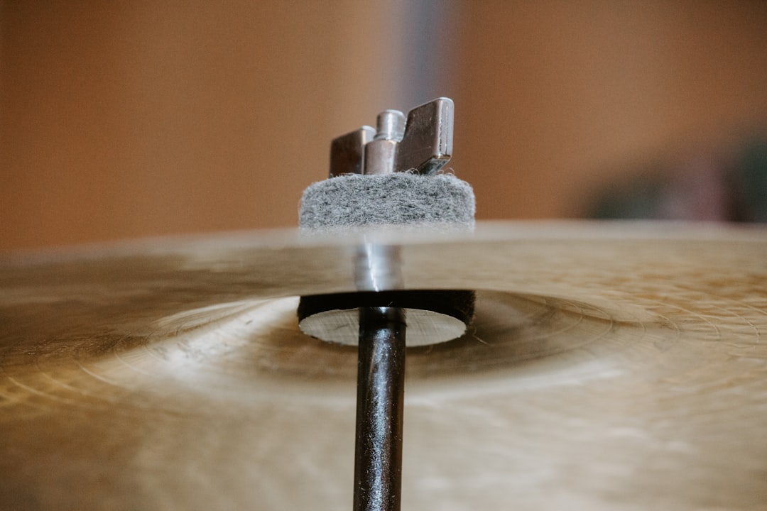 gray metal cymbals holder