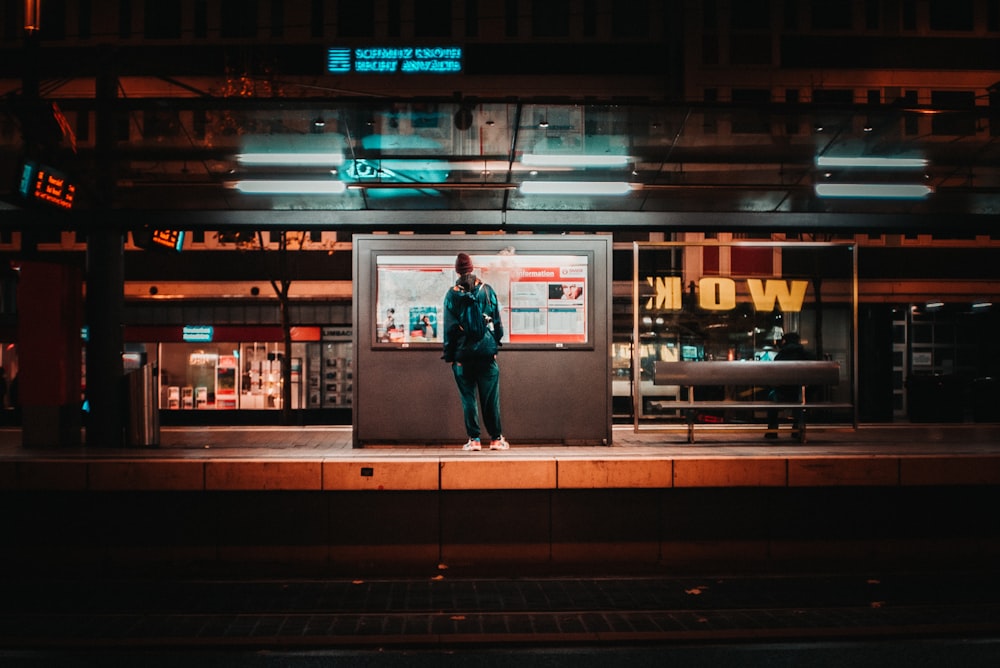 man standing in subway