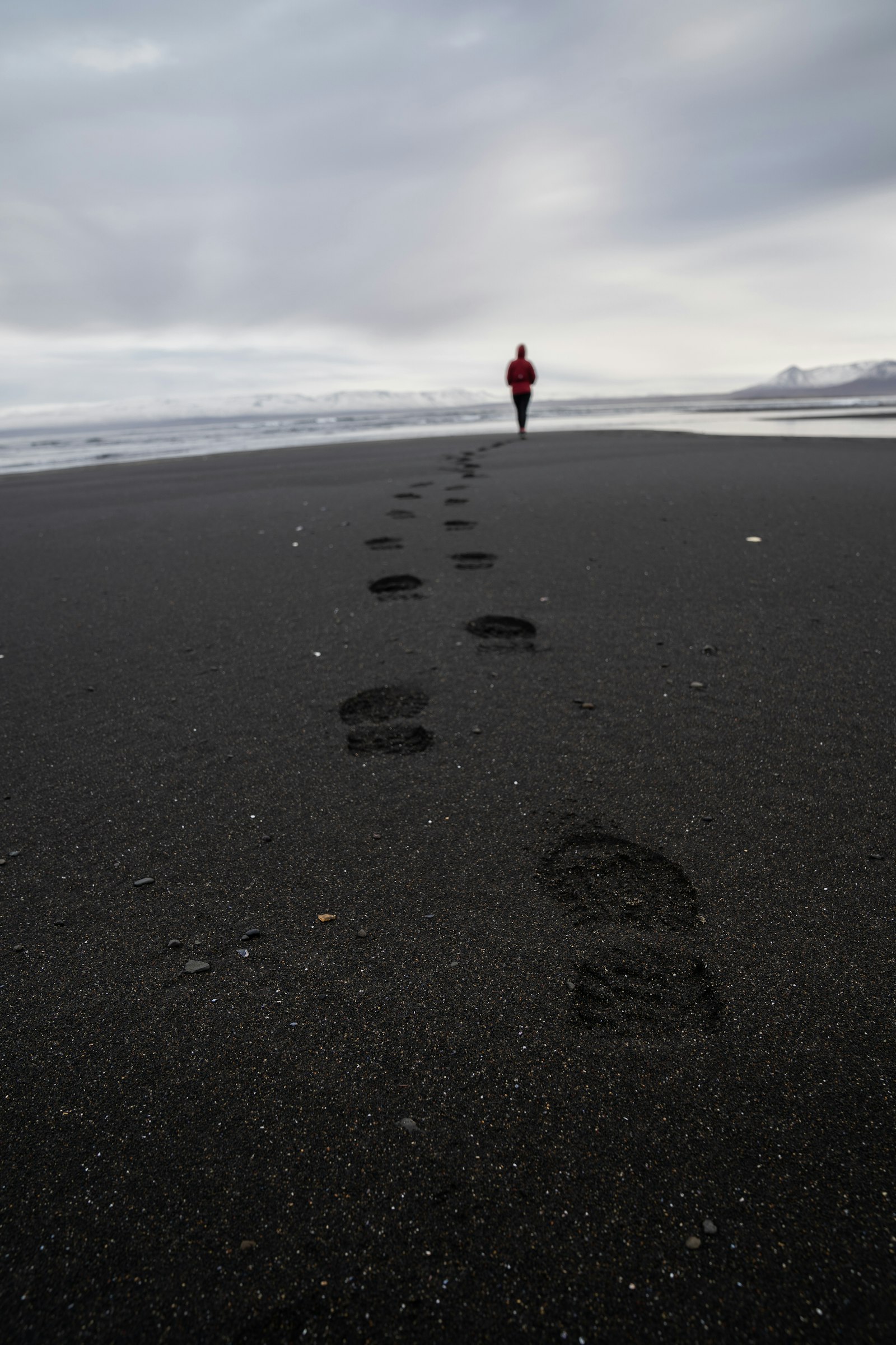 Sony a7 III + Sony FE 24-70mm F2.8 GM sample photo. Person walking on shoreline photography