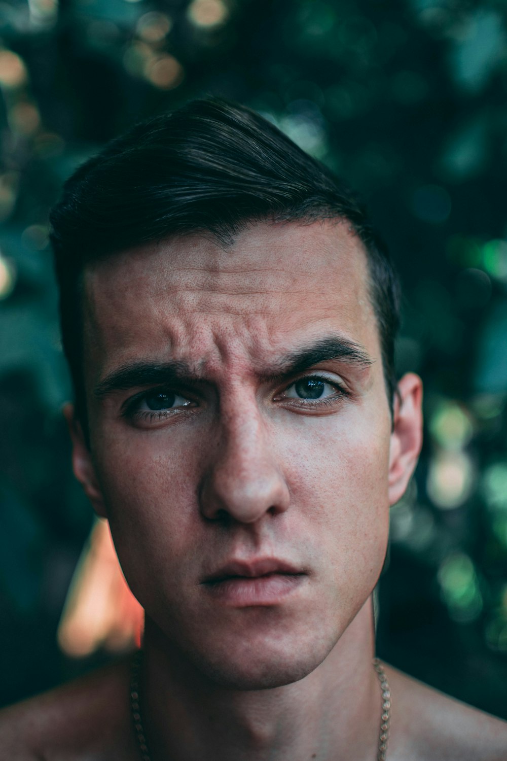 focus photography of man's face