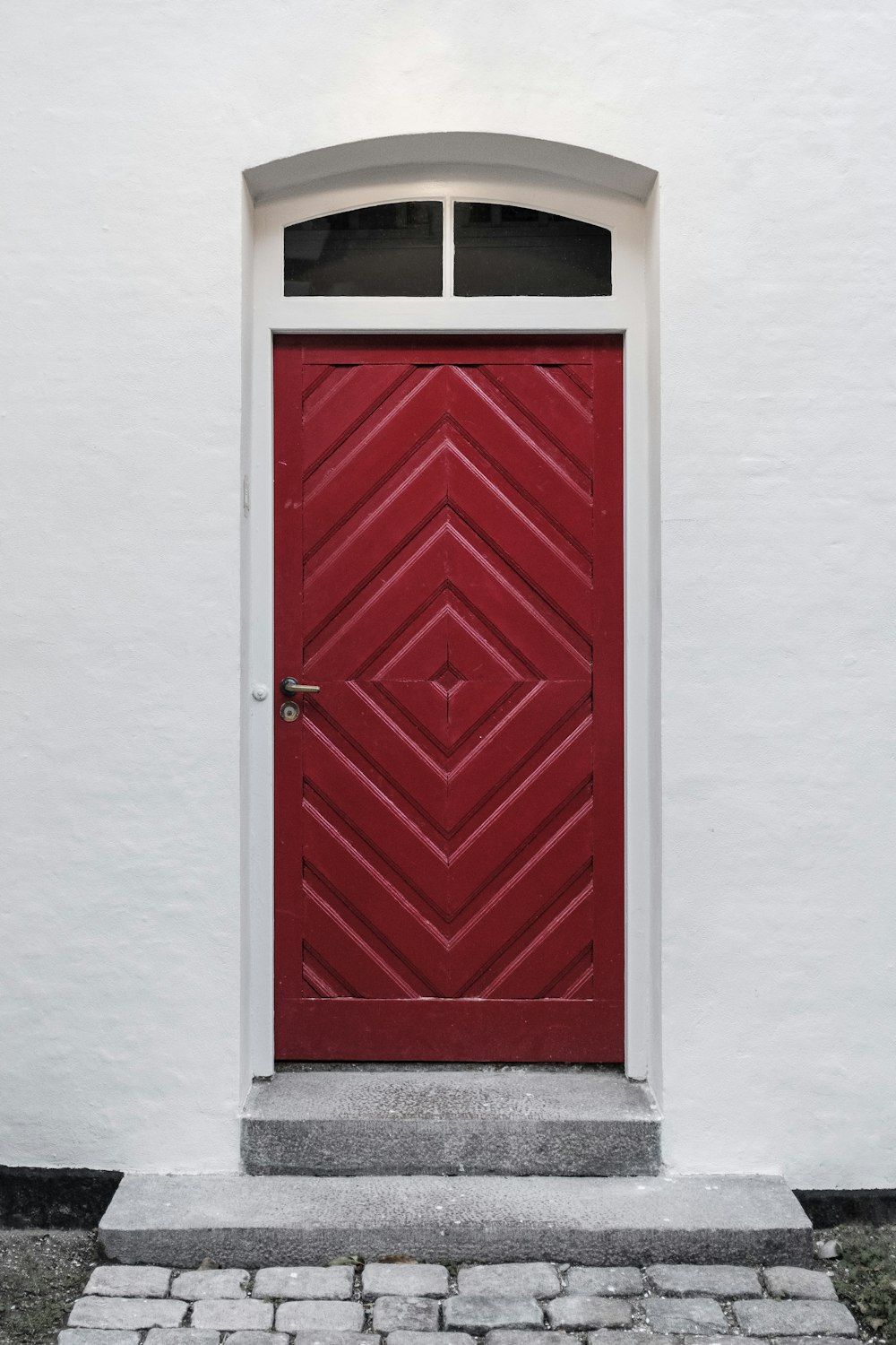 closed red wooden door