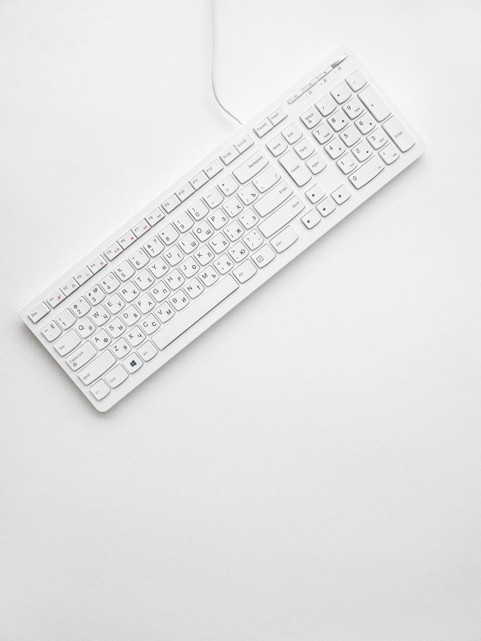 Mechanical keyboard and desk setup with soft lighting