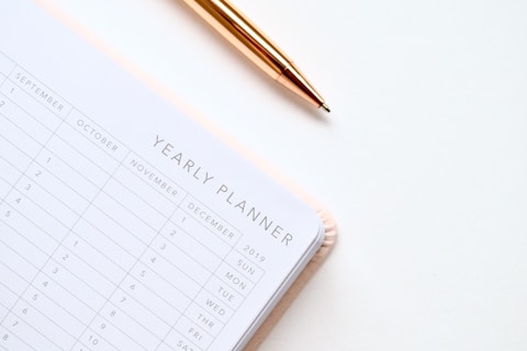 white and black yearly planner notebook