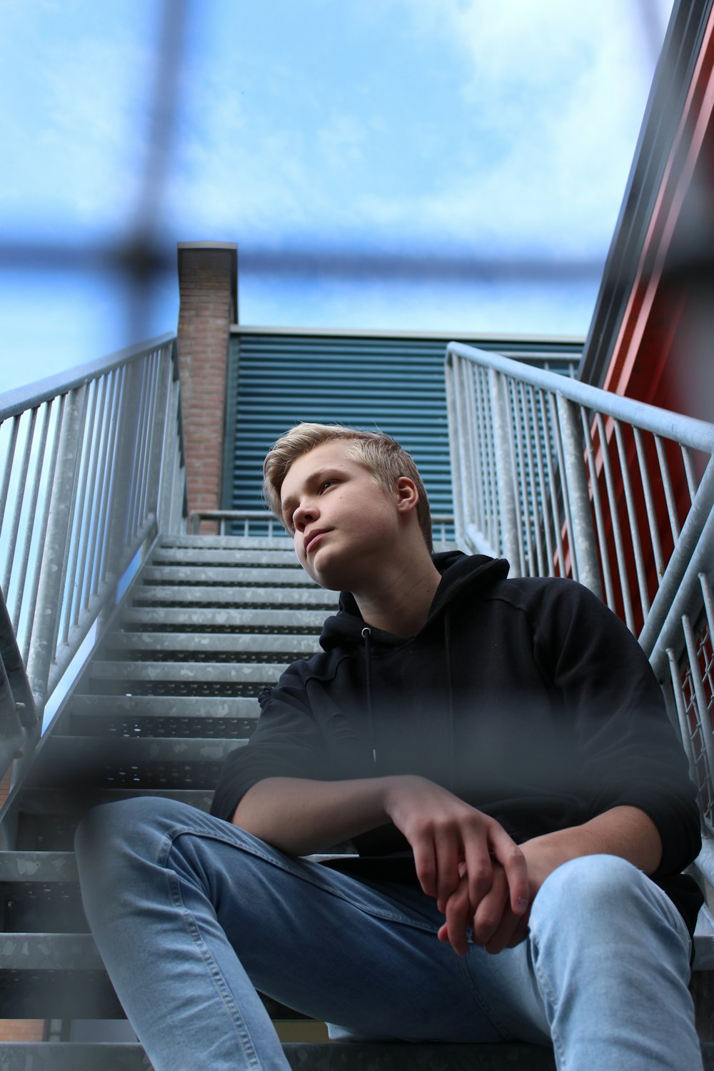 man sitting on stairs