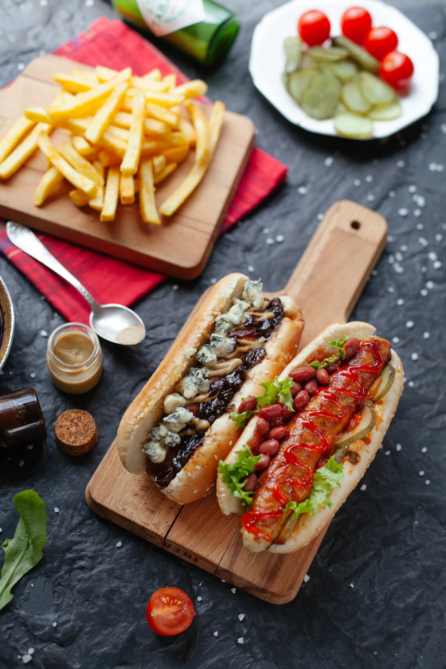 Gourmet hot dog served with a side of golden fries