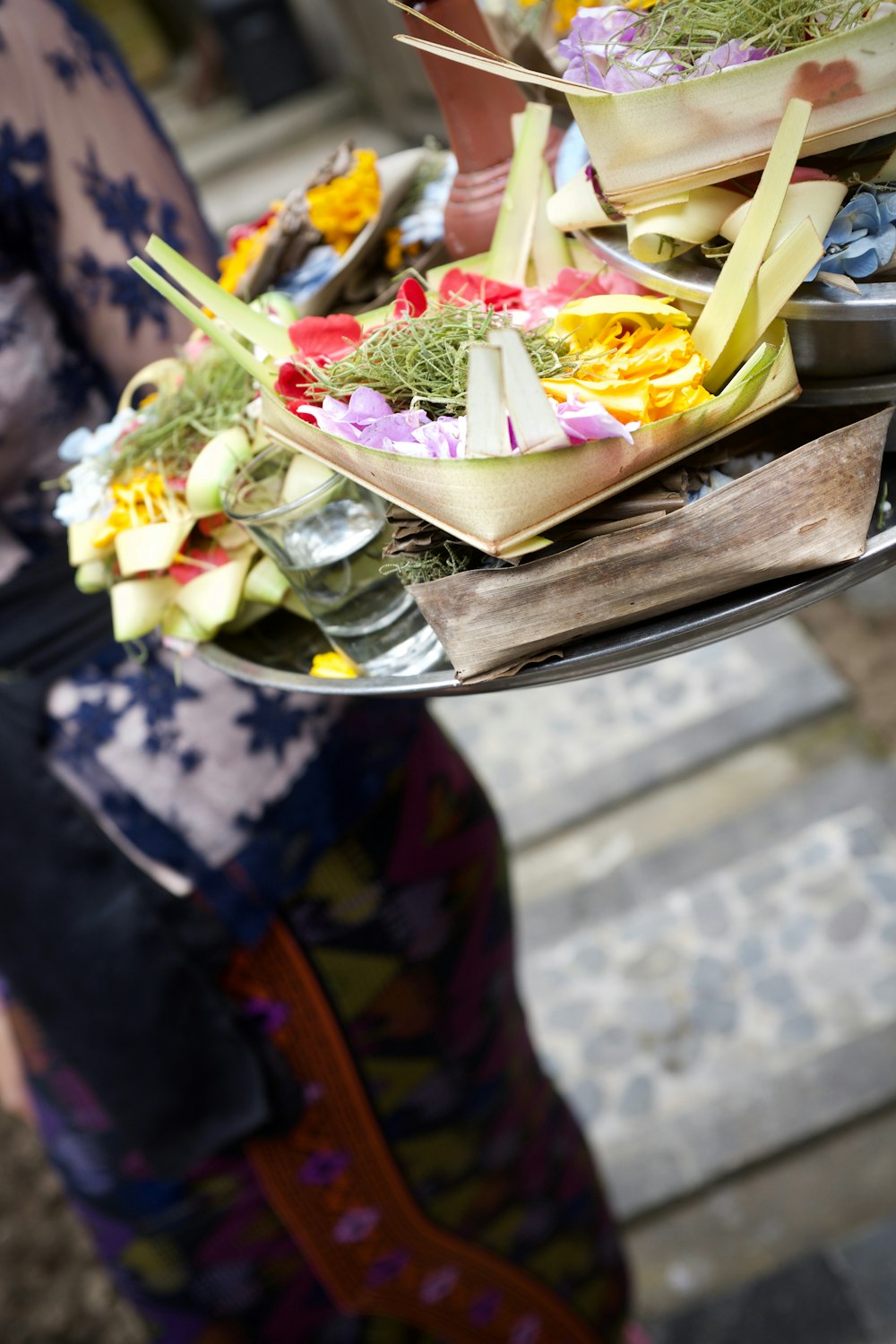 shallow focus photo of person holding tray