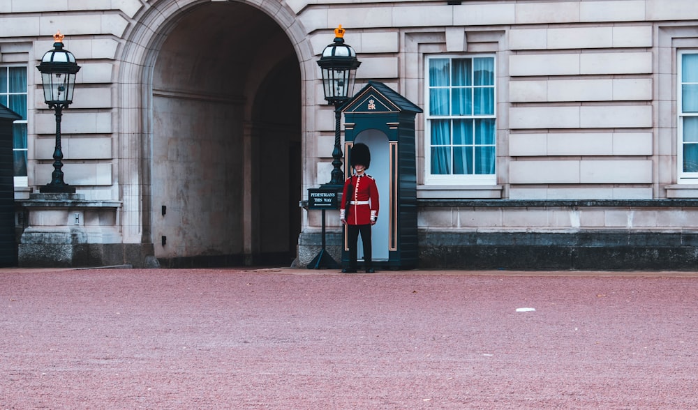 person standing near the building during daytime