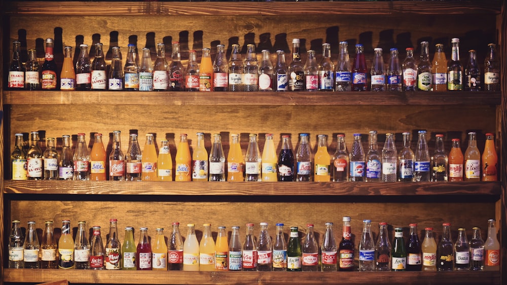 assorted bottles on rack