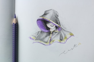 A pencil drawing of a figure wearing a hooded cloak. The cloak is primarily black and gray, with purple lining and yellow accents. The figure's face is partially concealed by the hood, showing a subtle smile. A purple and gray polka-dotted pencil is positioned near the drawing on the left side. The word 'cast' is written in cursive at the bottom right corner.