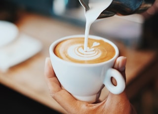 person making latte art