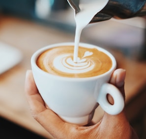 person making latte art