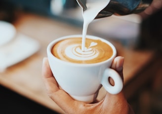 person making latte art