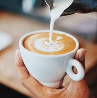 person making latte art