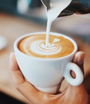 person making latte art