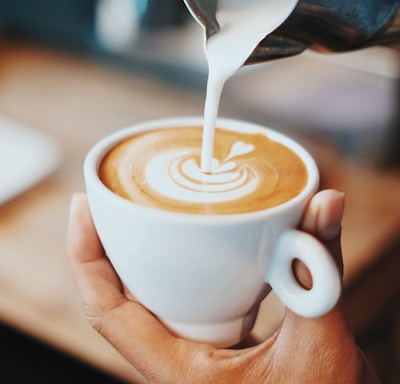 person making latte art