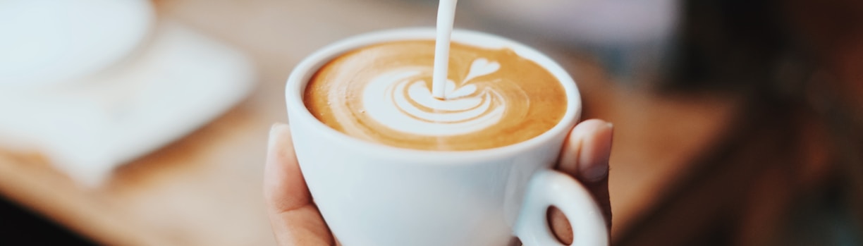 person making latte art