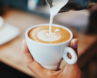 person making latte art