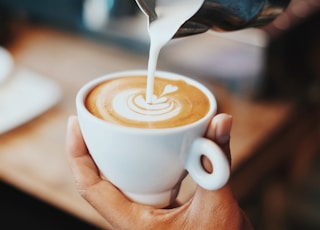 person making latte art