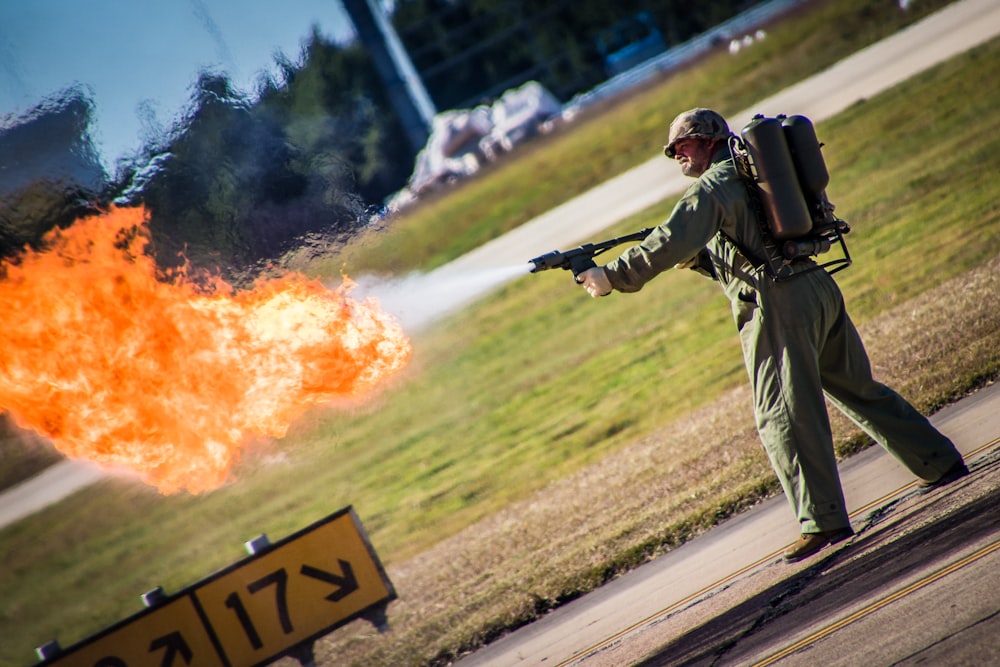 man holding flame thrower