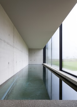Minimalist spa interior with pool and relaxation area