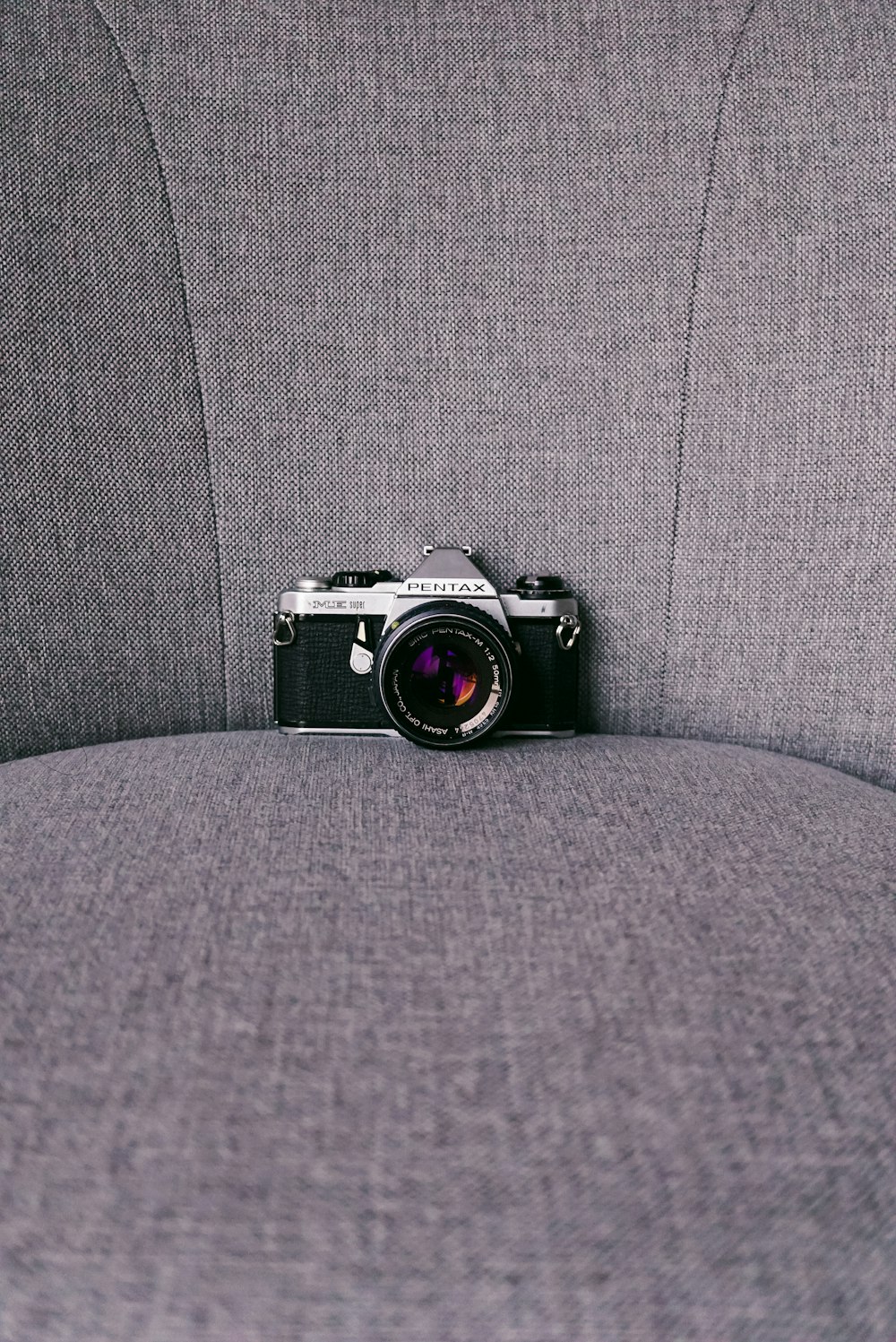 camera on sofa