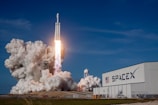rocket ship launching during daytime