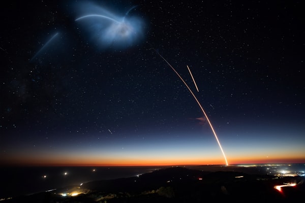 A timelapse photograph of a SpaceX launch